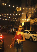 A short, sleeveless top with a back tie for an adjustable and comfortable fit.